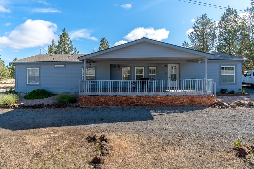 Dreaming of your own piece of Central Oregon where you can step out your back door to miles of BLM land - this is it! Situated on just over an acre, this freshly updated home is move in ready. The detached double bay shop awaits your boat, toys & projects too! Interior of home is filled w/ natural light, tons of windows, Laminate wood look flooring & neutral paint schemes. Kitchen was just refinished w/white cabinetry, black accents & slab granite counters. Dual living spaces, 1 off entry, other adjacent to 2 guest suites w/gas burning fireplace & Cascade views from the west facing windows. Master Ste at opposite end of home offers a spacious bath w/step in shower & separate soaking tub. Guest bath just updated w/concrete counter tops & stylish accents. Covered front deck is great for morning coffee & back deck offers private entertaining & bbq area. Fenced for pets & direct access to BLM out the north property line. Electric forced air heat w/air conditioning too!