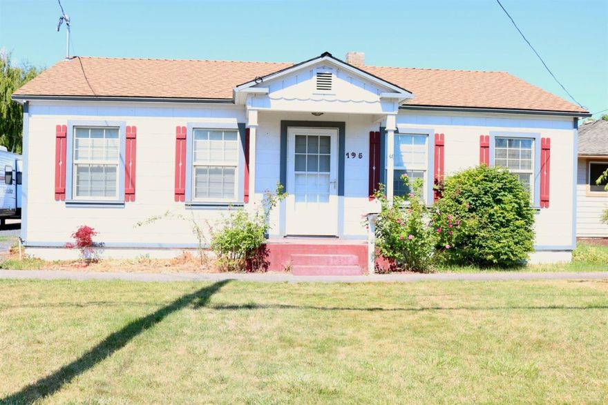 Cute Cottage style home set in Prineville's city corridor. Daylight style finished basement has laundry area. Appliances in the home included. Yesteryear charm throughout the home includes, wainscoting, arched entry to kitchen, hardwood flooring in living area, characteristic cabinetry, mature landscaping, fruit trees in the fenced back yard. Separate garden area, covered patio for year round use. Larger detached garage has storage room. Fantastic starter home or investment opportunity