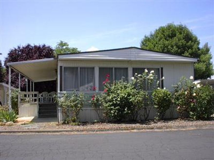 Spacious Doublewide 2 bedrooms, 2 baths 1440 sqft 60x24 Homette. Family room, large living/dining area. Built in cabinets(hutch) at dining room. Handicap friendly. Senior Park 55+. A/C is swamp cooler.