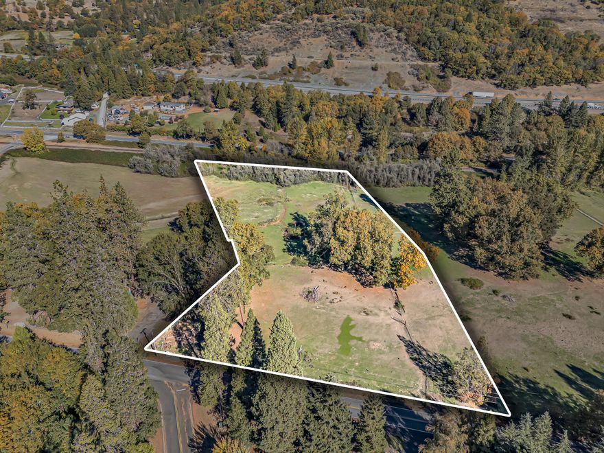 Beautiful 3.47-acre lot just south of Grants Pass, offering flat, usable land accented by stately oak trees and a serene country setting. Located near Pierce Riffle County Park and the scenic Rogue River, this property combines natural beauty with practicality. Zoned RR-1, it's ideal for building your dream home or creating a small rural retreat. The property features septic approval, a high-producing well (last tested at 14 GPM), and irrigation rights from the Grants Pass Irrigation District—providing excellent water and utility resources for landscaping, gardens, or hobby farming. Enjoy peaceful rural living just minutes from town conveniences. The neighboring 3.49-acre parcel (4490 Averill MLS #220211327) is also for sale. Please inquire with listing agent for details.