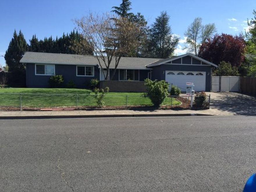 What a great home for entertaining with an in ground Pool! Huge front and back yard. Two separate family rooms, warm cozy fireplace, and a side lot with RV parking behind fence. Room for everyone! Excellent area close to schools, hospital and shopping. Exterior paint, 1 year old. Roof in great condition. Fresh paint on interior and all bedrooms with brand new carpet. Water heater 1 year old. Backyard patio 1 year old.