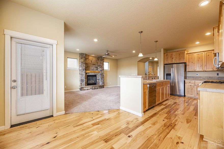 Opportunity knocks! Sun Meadow is one of Bend's favorite neighborhoods with quality Pahlisch built homes and amenities that include a community pool, clubhouse and park. The popular Hamilton floor plan features a great room with floor to ceiling stone gas fireplace. The spacious kitchen has Hickory cabinets, hardwood floors, tile counter tops, Stainless Steel appliances, breakfast bar and pantry. There is a den on the main floor and a powder room. The staircase has Wrought-iron banister handrail that leads you to the master suite and master bathroom with double vanity, tile counter tops, soaking tub, walk in shower &amp; custom walk in closet. 3 additional bedrooms or the option of making one a large bonus room with a Jack-n-Jill bathroom. Other bonuses include central A/C, fenced and landscaped yard with sprinkler system, 3 car tandem garage, forced air gas heat and water heater, roof replaced 2017 &amp; HOA dues are only $57 per month. The home is turnkey and ready for occupancy.<br>