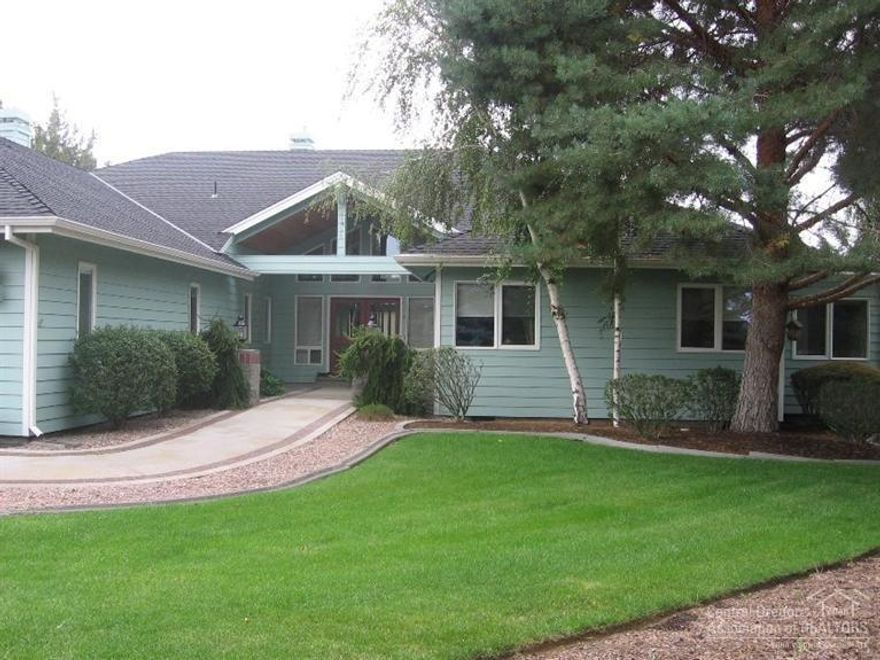 This custom built home by Frank Ring has never been on the market. It is a sprawling ranch located at the end of a quiet gated cul-de-sac and backs to the 4th fairway of the Resort Course. Custom Bose stereo system with speakers in every room. Coffered ceiling in formal dining room and hallway. Open concept kitchen, family room with fireplace & eating area. Triple car garage with exercise room complete with mini kitchen and full bathroom. Add your personal touches to make it your own.