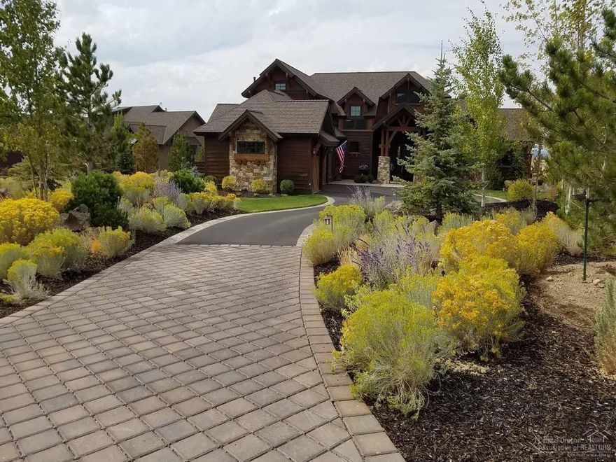 This is a special once-in-a-lifetime house. The mountain views in every direction promise amazing sunrises and sunsets. The great room and kitchen invite you to have intimate gatherings or cozy up in front of the massive fireplace in the winter. The spacious master bedroom and luxurious bathroom are main level with a family room upstairs-ideal for a theater room or art studio. Custom finish work includes planked hardwood floors, wood-wrapped windows and custom woodwork throughout. Come home to magic.