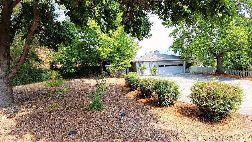 This home on Starlite has great updates, all one level and move in ready. Lots of parking on paved driveway and street. Nice fenced yard with patio and areas to garden with irrigation rights. Upgraded energy wise hot water system and one for heating as well. Located in the majestic Northwest area of Grants Pass, walking paths, parks, downtown and schools just minutes away. Beautiful open living room new flooring, carpet and paint. See for yourself and move in tomorrow. Two car garage also is a big plus with storage room on left side. All information deemed accurate but not guaranteed and subject to change at any time.