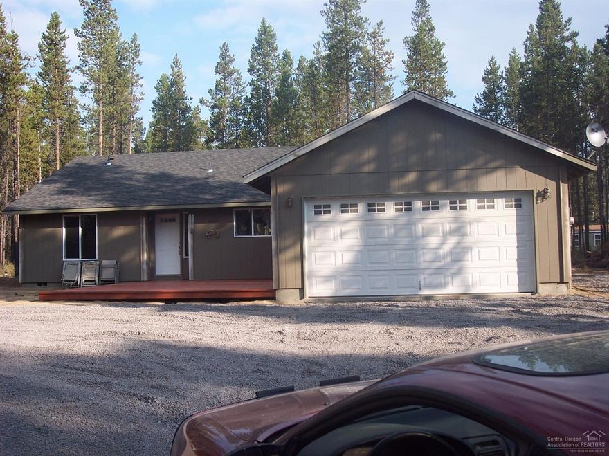 This one+ acre property is close to the Deschutes River. Nicely treed property with room for all your toys. Great room has vaulted ceiling making it perfect for family gatherings. Best route to get there is to go down Lazy River Dr. Take a left on Tamarack then go down to White Oak and take a right.