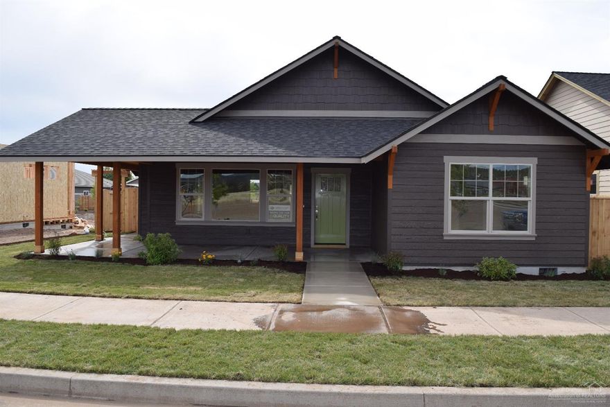 Just completed! New energy efficient single story Earth Advantage Certified home w/ great views by Award Winning Rogue Builders in desirable Ironhorse neighborhood. Home features great room floor plan, gas FP w/TV nook, SS appl, upgraded Knotty Alder cabinets w/granite slab counters & tile backsplash, kitchen island w/bar seating, beautiful laminate wood flooring, vaulted great room/master, lrg walk-in closet & tiled shower, front/rear landscaping w/sprinkler system,fenced yard, covered wrap around patio.