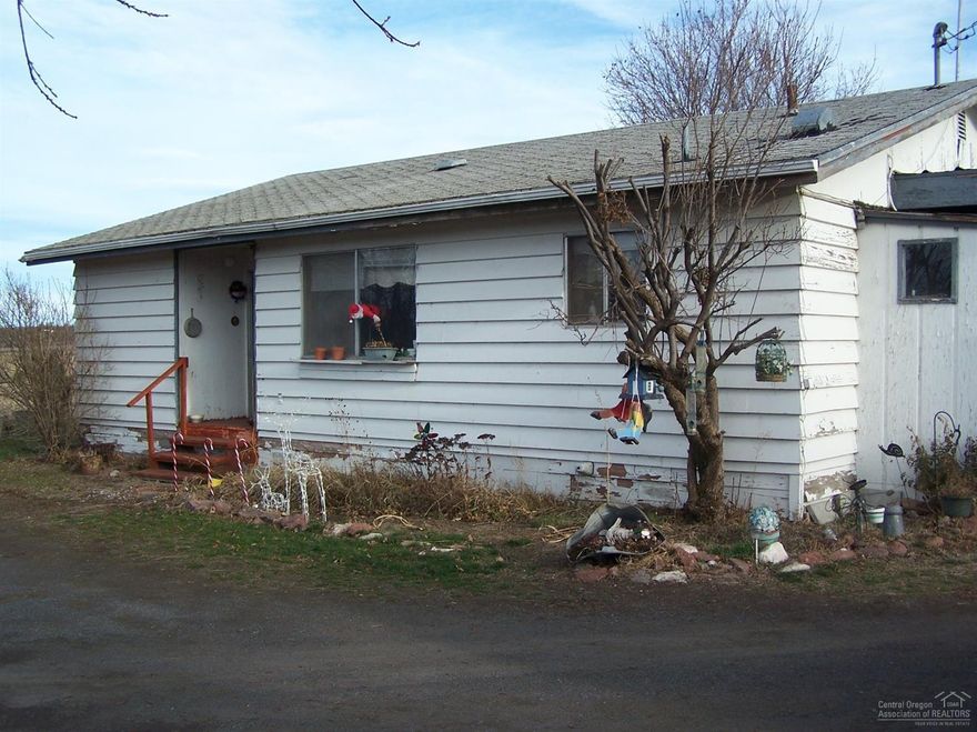 <div>Opportunity! 1168 Sqft older 2 Bedroom 1 Bath Home, with a 355 Sqft cement floor shop and a barn, on .36 acres. All for $135,000. Would make a great rental or fixer upper with a bit of TLC. All appliances included. </div>