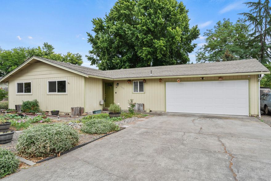 Fantastic opportunity to move to desirable East Medford! Located in a great school district, this home offers an oversized living space with 3 bedrooms, 2 bathrooms, a 2-car garage, and RV parking. The backyard is perfect for entertaining, featuring mature trees and plenty of room for gatherings. Recent updates include a 2-year-old HVAC system and windows.  Don't miss out on this incredible opportunity!