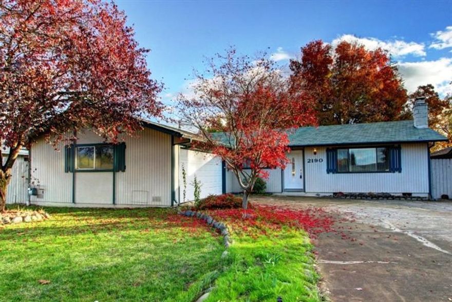 Lovely East Medford Home, Great Location, Large Lot with Lots of Extras! Close to Kennedy School and shopping. Newer heating/air conditioning system, newer interior paint, extra large 2 car finished garage with pull down ladder for extra storage, large back yard with small deck, ceiling fans in every bedroom, brick fireplace with wood stove, and more. Mature landscaped front and back yards with timed sprinklers, fenced back yard, and large shade trees. Plenty of extra parking too.