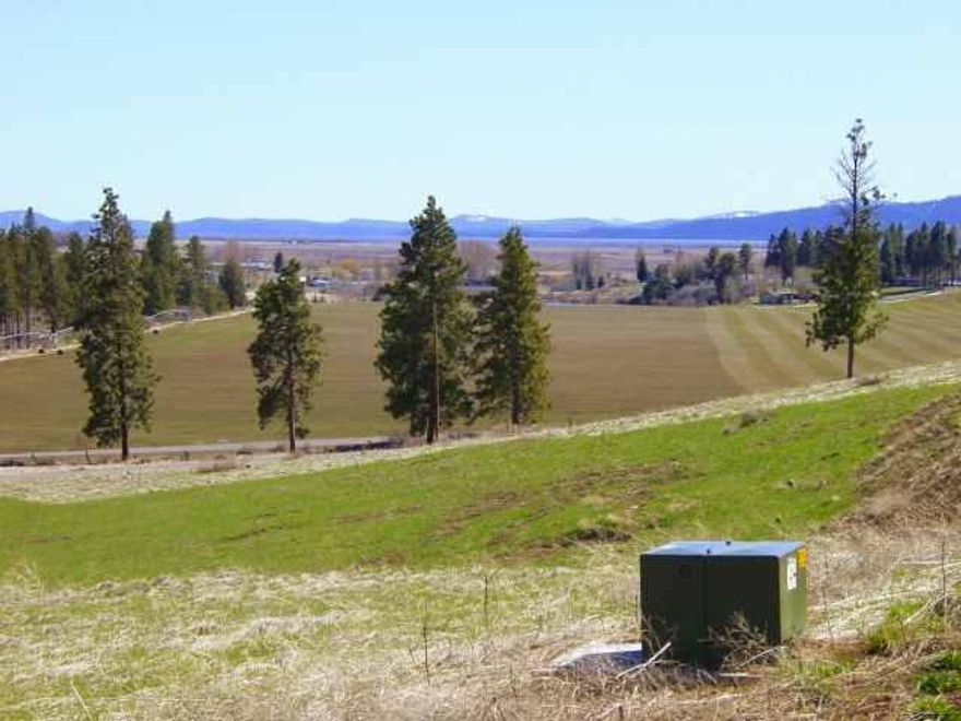 Big Beautiful View Lot With Underground Power And Phone Line Along Ranchwood(Transformer Adjacent To Lot). Slight Southeasterly Slope. Open Grassy Lot. Okay For A Manufactured Home. Nice Homes In The Area. Dues $100 Per Year. Lake Access.