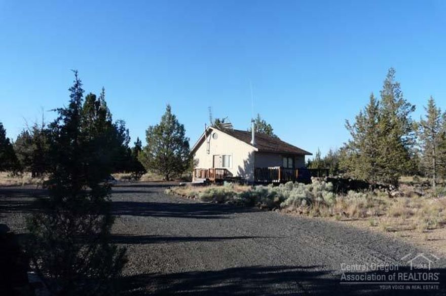 Perfect 768 SF cabin at end of cul-de-sac inside 4000 acre gated community with private marina access to Lake Billy Chinook. Private gun range, dry desert golf, ATV riding and MILLIONS of stars! This is a great buy, come play in the heart of Central Oregon.
