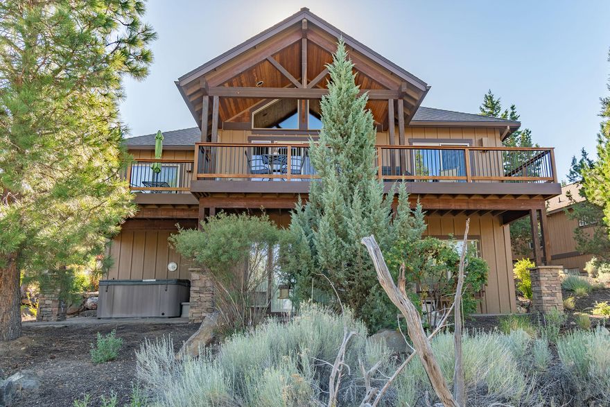 Gorgeous custom home by award winning Sun Forest Construction In Vista Rim community at Eagle Crest Resort.  fully furnished, ..  The open concept floor plan features, knotty alder solid core doors, wrapped windows, trim and alder cabinetry throughout. The great room features hardwood floors, vaulted tongue and groove wood ceiling, built-in entertainment center, and gas fireplace. Open kitchen with breakfast bar, built-in pantry, Tile countertops,  stainless appliances. Primary suite with Beautiful coffered ceilings, double-sink vanity,  walk-in closets w/ built-ins, walk in shower, and soaking tub. Central Vacuum. A utility room and half bath complete the main level. Two additional guest rooms, A full bath, Den room on the upper level. . New roof/exterior paint in 2020. New Heat Pump! Beautiful Landscaping with sprinkler system and hot tub.