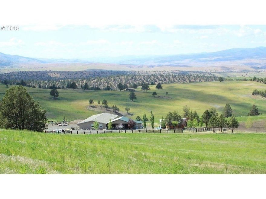 Beautiful home on a breathtaking view property. Home is placed out of sight for complete privacy. Property is located on Angel Gulch boasting 7 springs throughout the property. Deer, Elk & Antelope. Property is fully fenced, much of it planted in grass and alfalfa. This land can be dry land farmed, used as pasture. Seller will consider acceptable trade or Owner carried contract with acceptable terms and conditions.