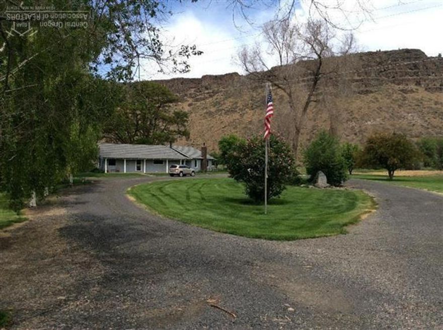 River frontage, mtn views, beautiful improvements. 188+ ac, 89.6 ac flood irrigation. This ranch has it all. Large ranch house boasts new, 50yr roof, windows, & blinds. Abundant windows frame Cascade Mtns & rimrock views. Lg kitchen features Wolf cooktop,SS appliances, & breakfast area. Covered, tiled deck w/access from master to sauna. 30x70 shop, hay barn, & older barn w/indoor livestock working facilities. Park like setting w/2 complete RV hookups. Great purebred setup too.