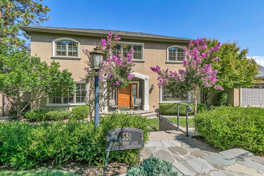 French provincial-inspired custom home located directly above Hald-Strawberry Park, just five minutes from Ashland's downtown plaza. Main level living room with integrated speakers, art lighting, gas fireplace, dining area with French doors to expansive view deck, gourmet kitchen with Electrolux Icon convection ovens and six-burner gas cooktop, powder room, media room, and office or guest bedroom with full ensuite bath. Spacious upper-level office, family room, and library with French doors to view balcony, gas fireplace, extensive custom built-in shelving. Primary bedroom with sitting area, two walk-in closets, and two full ensuite bathrooms with tiled showers, soaking tub, and sauna. Huge lower-level bonus room with washer, dryer, and utility sink. Detached three-car garage with attic storage. Landscaped grounds with mature trees, ornamental plantings, sunny gardening areas, grass lawn, stone and concrete patios. Inquire for details!