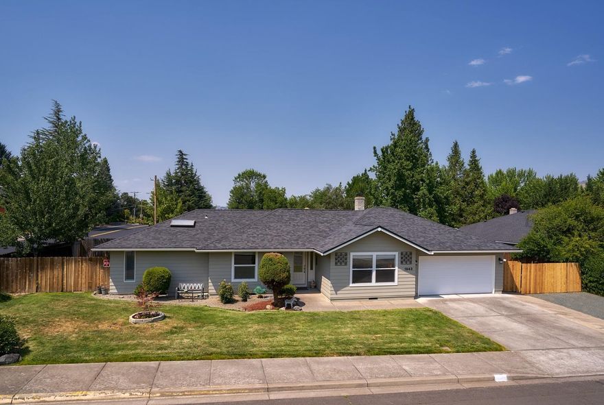 Gorgeous and fully updated home in East Medford. This 3 bed 2 bath home has an enormous kitchen w/ all new cabinets, self-closing doors, hardware & a roll-away island. The kitchen has all high-end stainless appliances including; Dishwasher, Microwave and Range w/ Convection Oven. The kitchen has Granite counter tops w/ custom mosaic tile back-splash & tile floors that flow into the dining area. The living room has new hardwood Bamboo floor w/ large vaulted ceiling. The master bedroom suite is extra-large with coffered ceiling & a master bathroom w/ new vanity double sinks, granite counter top, tile floor & custom tile shower, skylight & large walk in closet. The hall bathroom has double raised bowl sinks & custom tile floors. All light fixtures have been updated with LED. Both the front/back yards are fully landscaped w/ sprinkler/drip systems. The backyard patio has a covered area off the dining room. Large Laundry room w/utility sink/extra storage. Large RV Parking.