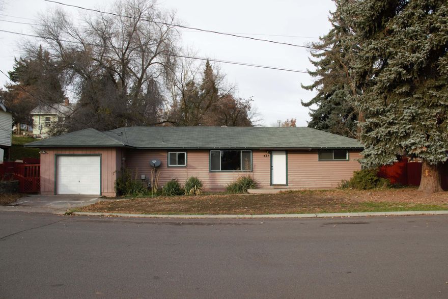 Spacious 3 bedroom 1 bath home. Built in drawers and cabinets in 2 of the bedrooms for storage. One car garage has shelves for your storage needs. Fenced in backyard for your fur babies! The equally spacious country kitchen is open, plenty of room to move around in. Large utility closet for washer and dryer with some shelves. Home is 1338 sq. ft on .17 acres.