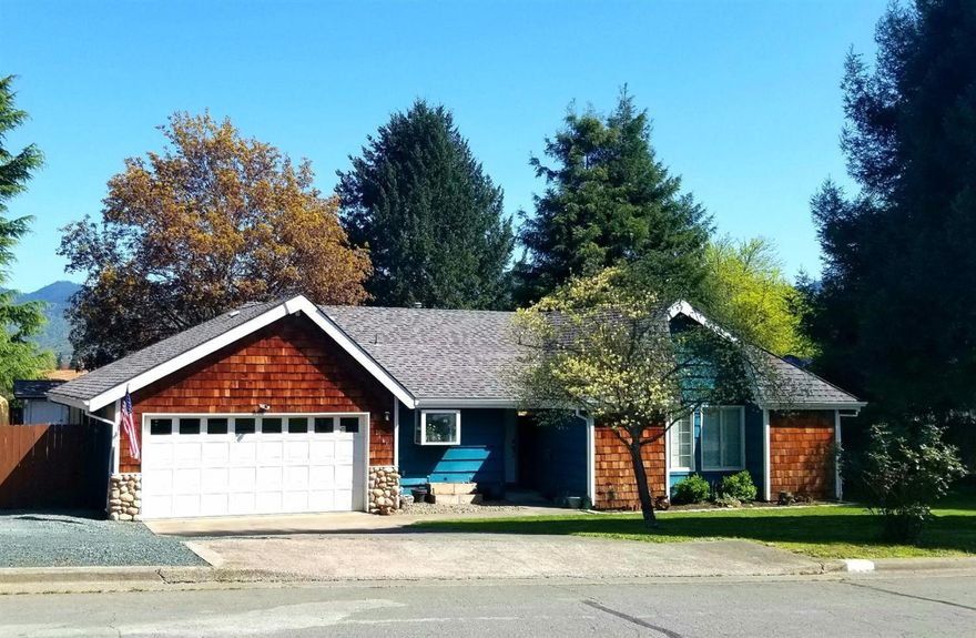 This recently updated home was built in 1979 and is 1,462 Sq. Ft. with 3 spacious bedrooms and 2 bathrooms. The interior walls have been recently painted and there is new flooring throughout the house. The floorplan boasts a large living room for entertaining guests, as well as an extra great room. The kitchen is beautiful and offers plenty of storage space and an island. The large .27 acre lot which is newly graveled leaves plenty of room for RV parking. The backyard has a shed for storage, a large garden area, a stamped concrete patio, and is entirely fenced for privacy. The space lends great opportunities for hosting guests and parties. This home is in a convenient location for schools, shopping, and parks, yet is in a quiet and friendly neighborhood.