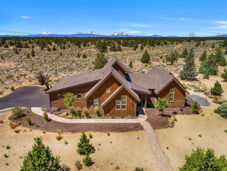 Stunning single level home nestled in the beautiful Central Oregon High Desert on the westside of Brasada Ranch. This home is uniquely located adjacent to
common area and 4500 + acres of BLM land for an amazing sense of privacy. The nearly new home has 3 bedrooms, 2 baths, 3 car attached garage, and
features a spacious open great room floor plan, with high end finishes. There are vaulted ceilings, a large kitchen island perfect for entertaining, stainless
appliances, spacious closets, inviting patio with hot tub, and landscaping recently upgraded, Furnishings are included with some exclusions. Enjoy all the
benefits of Club membership including the Athletic Center with 3 pools, water slide, Equestrian Center, 18 hole golf course, Spa, restaurants, hiking and biking,
horseback riding and much more!
