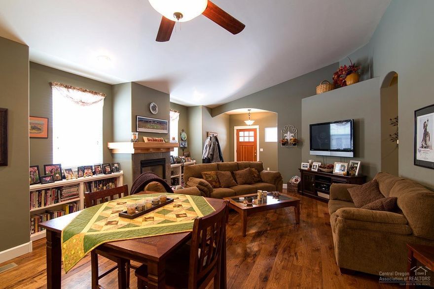 Charming Craftsman style home on a corner lot in a nice neighborhood. This very well maintained home features an open great room w/gas fireplace, huge bonus room on second floor. Large kitchen w/tile counter tops, slate floor & eating bar. Hickory floors in great room. Master suite on the main level. This home has a nice patio w/water feature and back yard is fenced. Heat pump w/air conditioning. Great home and location!