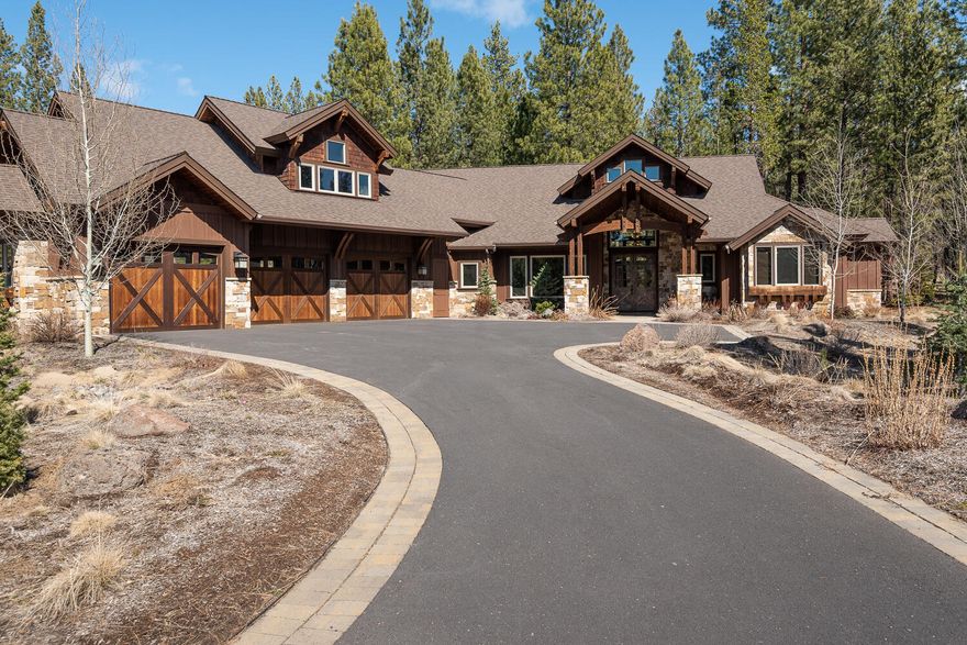 This gorgeous home in the Caldera Springs was custom built by Pineriver Homes in 2015. A desirable floor plan with the master and two guests suites on the main floor. The kitchen is a chef's dream featuring a copper apron front sink, custom wood hood, pot filler, and more. The large laundry room includes a built-in mud room bench with storage. The master bedroom is sure to wow with floor to ceiling stone on the fireplace and custom wood ceiling and cabinets. Upstairs there's a bonus room, a bunk room and a full bath. The private backyard features a gazebo with a built-in BBQ. This beautifully finished home has custom upgrades throughout that are sure to please!