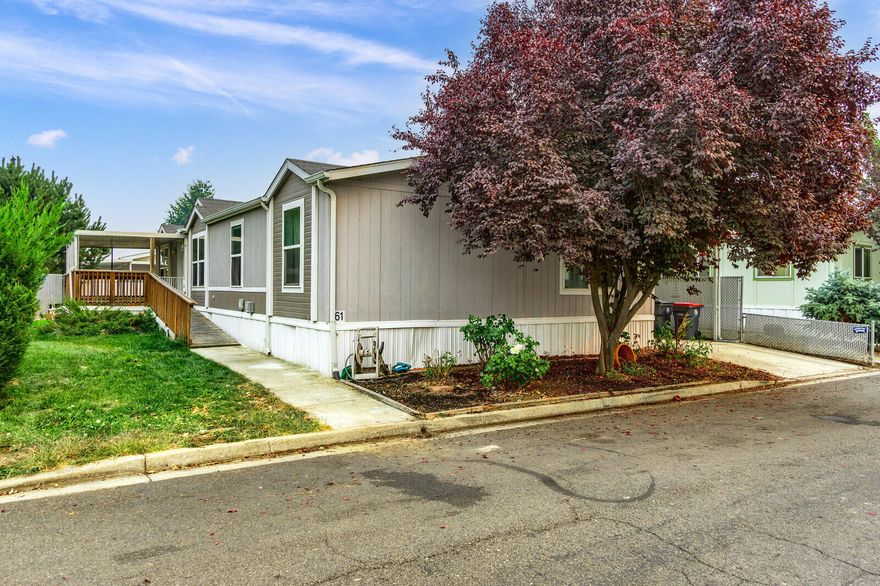 Nicely affordable in-park manufacture home. Located in Meadow View Estates This home has a split floor plan with very open living areas including vaulted ceiling. Home could easily be a 4 bedroom as there is a family room that can be either an office or bedroom. Outside is a large deck and a shed for storage. Just minutes to shopping this a very nice park to live in.