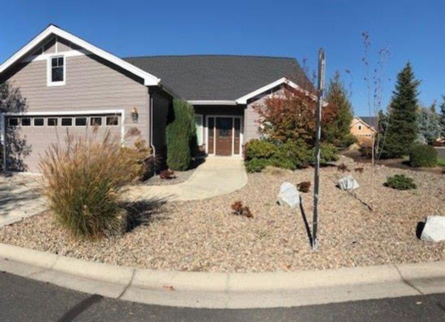 This is the home for you if you are looking to live in the Poppy Village Gated Community of the Eagle Point Golf Course. This home has custom cabinetry throughout the entire house. Beautiful kitchen with high end appliances, gas stove, stainless refrigerator and dish washer ready for you to entertain your guest. Dining area, large living room with corner gas fireplace and built in cabinets. Office space with custom built cabinets, 2 full bathrooms, 2 bedrooms and a nice sized laundry room! This home has a lot of custom amenities that you need to see for yourself! Come and enjoy the beautiful carefree life in the Poppy Village Gated Community.