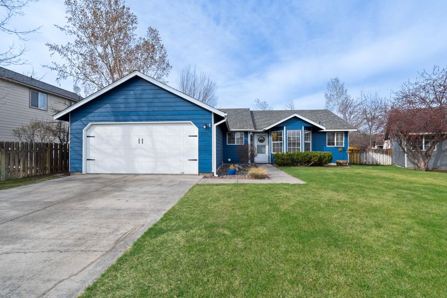 Immaculately cared for single level home w/ 3 bed, 2 bath nestled in a quiet neighborhood located in SW Redmond. Entry leads into the vaulted great room floorplan w/ ventless bio-ethanol fireplace, plenty of natural light throughout & space for entertaining. Spacious kitchen ftrs luxury vinyl tile, stainless steel appliances, plus an abundance of cabinetry & counter space w/ a large eating area surrounded by windows. Well-appointed large primary suite w/ dual closets & dual vanities in the bath. Two additional guest rooms share a full bath w/ the oversized laundry room conveniently located as well. Great outdoor living space with dual sliding glass doors leading out to the back deck & expansive yard w/ full landscaping. Conveniently located near Umatilla sports complex and other parks in the area! Has a ductless heat pump & A/C. New roof in 2017. New interior and exterior paint. New carpet. Don't miss!!! More professional photos coming tomorrow!!!