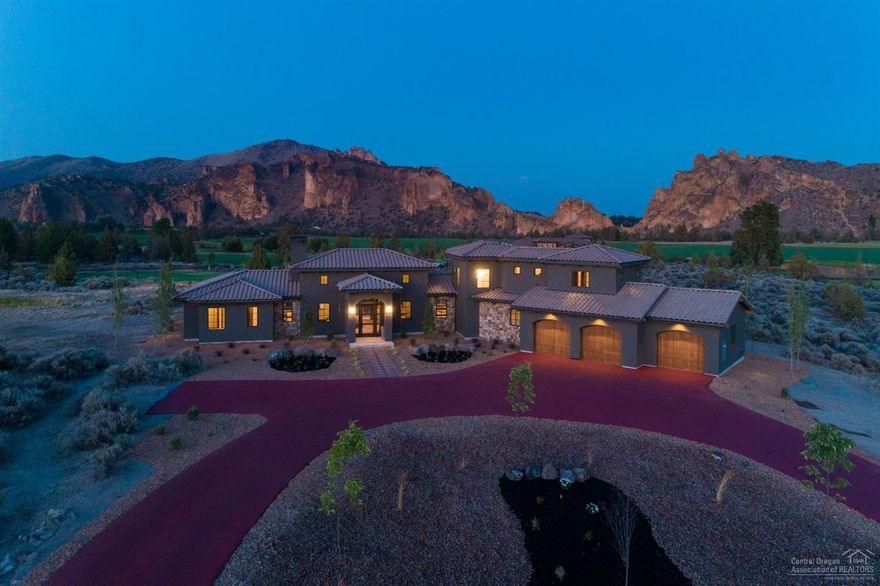 Exceeding expectations, this masculinely handsome estate boasts superior craftsmanship & cutting edge finishes. Found amongst the dramatic backdrop of Smith Rock in Ranch at the Canyons ''Villa Di Cascata'' leaves a commanding statement with nearly 3200sqft, 3 beds, 2.5 baths, office & bunk area. A powerful mixture of steel & reclaimed barnwood can be found throughout this industrial inspired home. Arto 3D architectural tile fire place & custom hand painted trays only begin to add to the magnificence.