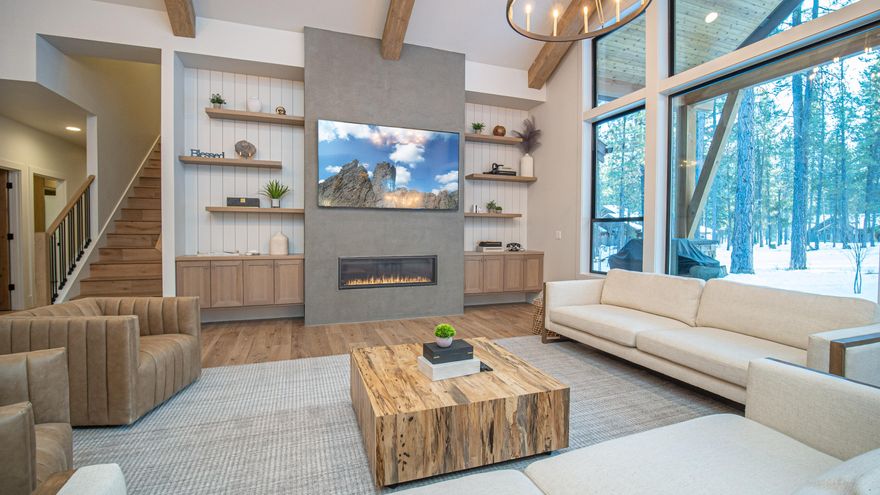 Come enjoy the custom mountain-modern home that offers ample gathering spaces perfect for large families, reunions, retreats and special get-a-ways. There are four on suite bedrooms on main level along with great room, gourmet kitchen with a butler's pantry, and laundry room. Upstairs find three more bedrooms (two on suite) plus a bonus room with pool and foosball tables. Expansive covered paver patio with hot tub enclosure. Features include distress wood beams, custom cabinetry, rich woods, solid surfaces, designer tile, high end appliances, water softener and Central Vacuum with a in wall hose, built in fridge and wi-fi enabled zoned Central A/C. Contact your agent to preview today.