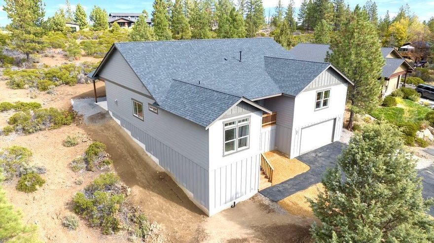 This stunning single-story, brand new home perched atop Pumice Butte offers an acre of space and breathtaking views; and is now move-in ready! It is located only mins from Old Mill District and downtown Bend.  There are just 2 homes on the 23 acres behind the property, creating amazing privacy. This home has 3 beds/2 baths, plus an office, lg flex room, oversized garage and detached workshop.  There is plenty of room for an RV, toys or another shop. Inside, you will find a spacious, open layout with a vaulted great room and top-notch finishes, such as quartz counters, hardwood floors, tiled shower & bath floors, stainless appliances and much more. A rock fireplace and hearth infuse the space with warmth and character. A large covered back patio is perfect for entertaining, and the front deck offers incredible Paulina views, creating a serene spot to relax and enjoy nature & local wildlife.  If you are looking for a beautiful new home, space and privacy, come check out this home!
