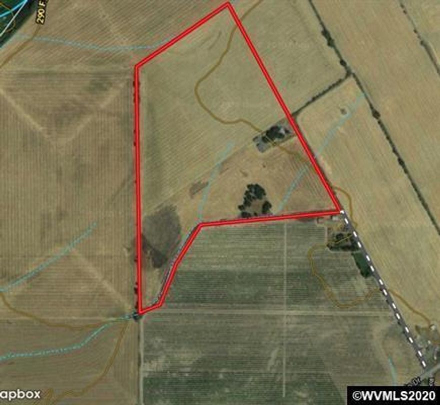 60.27 acres with 45.7 acres of water rights. Currently used for irrigated fescue production, with a 3 Bay 65 X 30 SQFT shop, 3 Bay Machine Shop and Workshop. Soils consist mostly of Woodburn and Amity suitable for Hazelnuts or row crops. Willamette Valley & Oregon Cascades views, ample space for entertaining & just minutes to I-5. The 3BR/2BA 1560 SF MFD Home is being sold in ''as is'' condition.