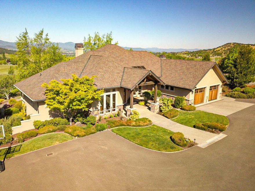 Welcome to this southern Oregon paradise! On the outskirts of Medford is the 12 acre property with large custom home, superb views, unmatched location, great irrigation with an intricate irrigation system, detailed and mature landscaping (complete with fruit trees, Bocce ball court, rock patio firepit area, and amazing grassy areas). Attention to detail is evident throughout the exceptional single level residence. 2 Master suites, 2 additional bedrooms, custom kitchen, picturesque views from all angles and high end finishes throughout make this a one-of-a-kind home. Located between Medford and Ashland, this truly is one of Southern Oregon dream properties! Don't miss this one!