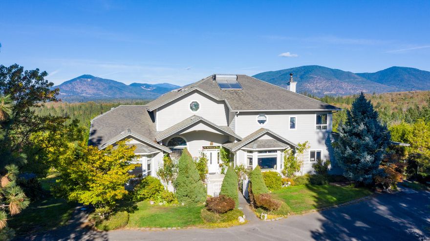 Exceptional private gated estate with detached 2/2, 1100 sq.ft. home, sq.ft not included in listing sq.ft. So much value in this 4 bed, 4.5 bath home that has 3 master suites. The main master is large with wall of windows to take in the expansive mountain views, tons of closet space, and gas fireplace. Beautiful kitchen, living room, family room, formal dining, soaring ceilings, wood burning fireplace, 4 gas/propane fireplaces & wet bar for entertaining. Large screened in porch & decking for relaxation. Lots of RV parking, about 4 acres are fenced of the 6.57 acres. Detached home has a separate garage attached. The grounds are beautiful & new owners could have weddings around the gazebo. Home & property offer so much. Come & take a tour.