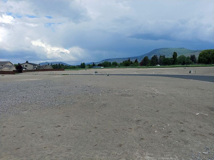 Build-able lots in the Pheasant Run subdivision ranging in acreage from .16 to over half an acre. Located in the suburbs, close to Peterson, Brixner and Mazama schools. Lots are surrounded by Pahlisch Homes built houses less than 5 years old. These lots are ready to be built on and in an established and well known subdivision, creating a great opportunity for investment!