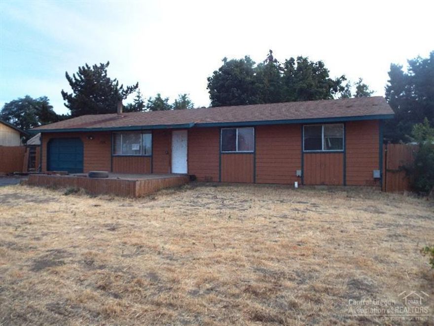 Cute single-level 3 bedroom/2 bath situated on hill-top lot close to medical, shopping, convenient to everything. Private fenced back yard is perfect for family BBQ, pets, or play; easily accessed from kitchen area via sliding glass door. Kitchen features all appliances & plenty of storage. Master bedroom features extra closet, attached bath. Utility area is off the hallway. Single attached garage is a bonus for parking, shop, or storage. Perfect starter, rental, or for down-size. Call now to view.