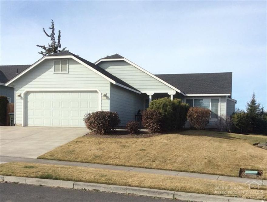 Mountain Views, larger corner lot, single level and RV parking! What more could you ask for? This charming home has views of the mountains from the kitchen, dining room, master bedroom and backyard! Vaulted ceilings, gas fireplace, Pergo wood floors, new carpet, new interior paint, covered front porch area and room for RV storage! Located close to schools, shopping and entertainment!