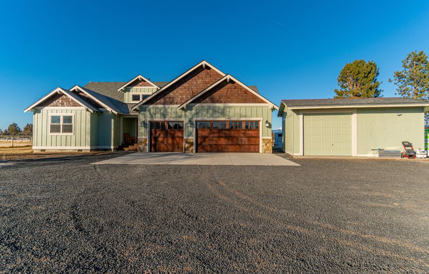 Custom single level home w/unobstructed Cascade Mountain Views! Situated on over 5.5 acres with 3 acres of irrigation. This beautiful 3 bedroom with an office has plenty of room to entertain and live. You will love the open floor plan. The kitchen has granite counters along with stainless steel appliances, amazing counter space, a huge pantry, & a spacious dining area create an entertainment area second to none. The great room has hardwood flooring and a wood burning stove. Additionally the home boast 3-car attached garage,  detached garage/shop, and shed. This one of a kind property won't last long. Exterior painted in 2021. Chimney cleaned in 2021. Heating/Cooling was serviced in 2021. Full duct cleaning 2021. All components related to irrigation included.