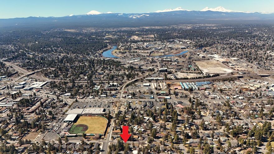 This vacant lot centrally located in Bend offers a prime opportunity for a small dwelling unit development. Situated in a long-established neighborhood with mature trees, the location offers easy access to grocery stores, parks, breweries, the parkway, Old Mill District, Deschutes River, and more. RM zoning and the new Small Dwelling Unit Development code, allows for 3-foot side setbacks and development of a SFR up to 800sf, or a SFR+ADU or duplex with up to 1200 sf cumulatively. The new Wilson Avenue improvements offer convenient east-west connectivity with new bike lanes & shared use paths. Power, internet, sewer, water, and gas utilities are available within the 5th street ROW. The lot is relatively flat, requiring minimal excavation and rock removal. Don't miss this chance to build much-needed housing in a centrally located neighborhood with significant development potential!