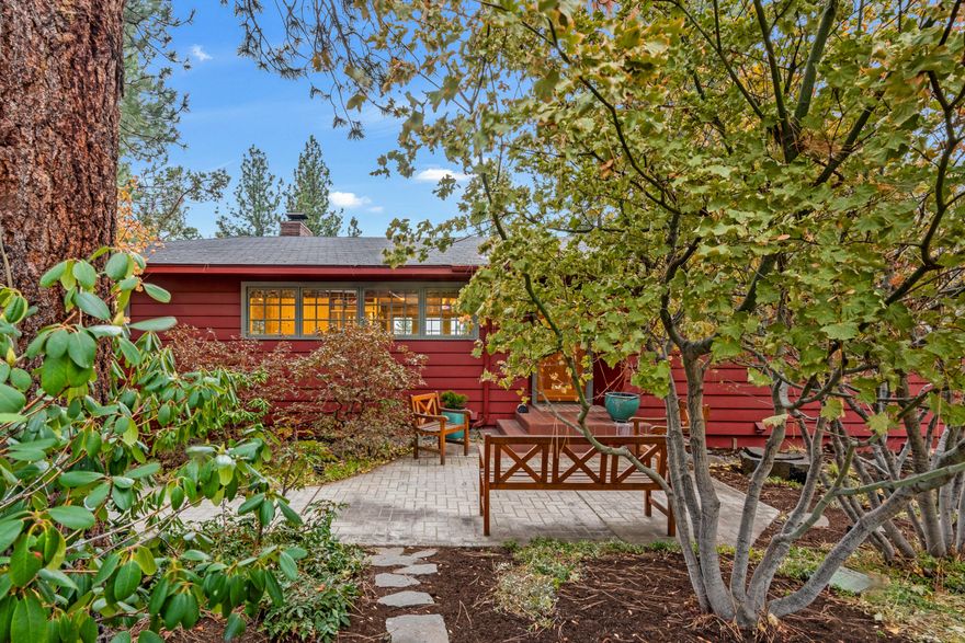 Desirable West Hills home situated among beautiful mature landscaping on a large lot with Southern views. Close-in location allows for walkable access via neighborhood trail to Newport Market area, restaurants, and downtown. Featuring wood floors, Caesarstone counters, open kitchen/living floor plan with bright windows to a large deck with a view. Large primary suite with dual sinks, soapstone counter, in-floor heat, and double-headed shower. Includes hot tub located off the primary bedroom. Laundry chute from main floor to the laundry room. Energy efficient gas furnace and air conditioning with WiFi-enabled controls. Enoy Hillside Park which includes a dog park, hiking trails, playground, and open grassy areas. Quiet, peaceful neighborhood with the convenience of living in town.