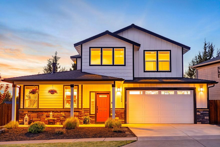 Welcome home to 2254 NE Indigo Lane. Built in 2020, this thoughtfully designed home features a fully renovated main level primary suite with soaking tub, glass enclosed shower, dual vanity, and elegant tile flooring. The open concept layout offers a spacious kitchen with quartz countertops, stainless steel appliances, gas range, pantry, and island ideal for entertaining. Enjoy beautiful laminate flooring, a cozy stone gas fireplace, and an outdoor deck off the dining area perfect for sunsets and morning coffee. Upstairs includes two large bedrooms, a full bath w/ linen closet, and a second living room with Cascade Mountain Views. Don't miss the walk in storage off the second living room! Nice two car garage with room to park a small trailer off the driveway for toys. Located on a corner lot minutes to Downtown Bend, Deschutes River, St. Charles Hospital, Mountain View High, On Tap, and Pine Nursery Park. This is a stunning home where convenience and great neighborhoods come together!