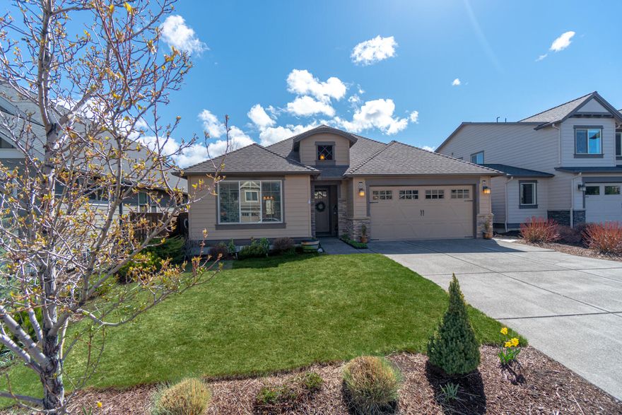 Immaculate single level home located in The Bridges at Shadow Glen where you can enjoy being close to downtown w/resort style amenities! 3 bed, 3 bath, 2005 sf home ftrs tall ceilings throughout, vaulted great room fp, skylights, decorative stone archway leading into living area, huge windows for an abundance of natural light, stone surround fireplace w/ hearth & mantle, wood flooring thru-out, formal dining room, & more. The kitchen ftrs quartz counters, knotty alder cabinetry, massive island & breakfast bar seating, large corner pantry, under cabinet windows & lighting, all SS appliances included. Vaulted primary bedroom ftrs tray ceilings, patio access, dual vanities, walk-in tiled shower, soaking tub, walkin closet, & tiled floors. Junior suite off entry w/ full bathroom plus an additional bedroom w/ full bath in hall. Low maintenance landscaping, covered patio, hot tub, pear tree, storage sheds, bbq hookup, & backs to walking trail + tons of community amenites! DONT MISS this one!