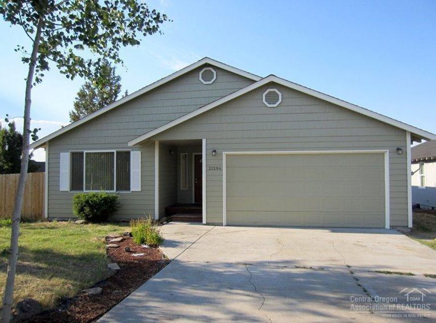 Super BARGAIN! Nice, TRULY move-in ready home. New Exterior Paint, New Countertops just in & New Carpet! Newer appliances. Light, Bright, Spacious. Covered entry, Large Living Room w/ vault plus Family Room, cabinets in great shape. Big side yard ready to landscape w/ RV Access. Lots of storage. Tall crawlspace is a storage bonus. Fenced yard, Space in back for dog kennel or storage. Dare to compare at LESS than $137 SF!!