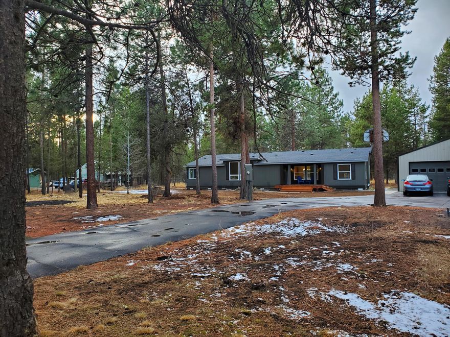 This 2633 sqft, 3 bedroom/2.5 bath home on .98 acres is centrally located near year-round recreation: Mt Bachelor,  Cascade Lakes and resorts, trails, rivers, golf courses! Fully updated! New int/ext paint, new well & pump, New counters/backsplashes, new furnace & hot water heater, decks and plumbing/lighting fixtures. New flooring including marble counters & backsplashes.  New Marble, laminate floors plus new carpet & credit allowance for your personal touches!,  Features two living rooms and master suite separation w/reading or office area, walk-in closet, dual vanity. New roof to be installed.