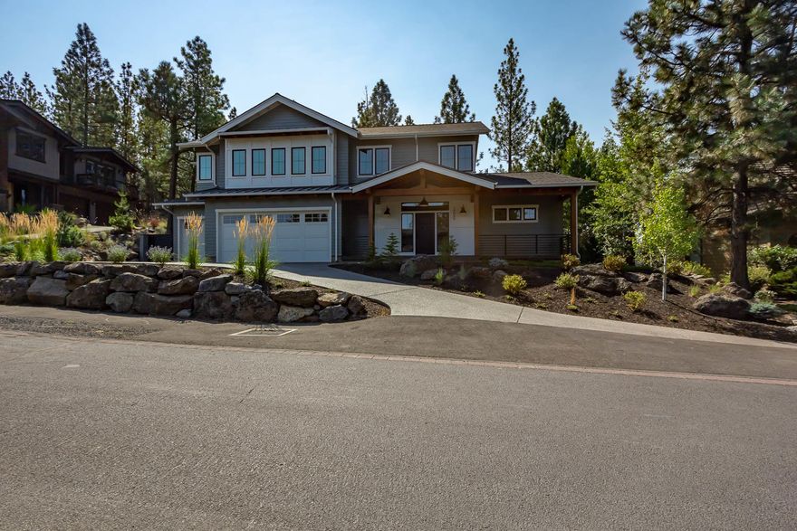 A significant amount of thought, care and attention to detail went in to this 3140 sq ft home located in the peaceful Three Pines Neighborhood. Built in 2019, this one of a kind custom built home has a fabulous floor plan which includes master on the main, a resort feel, spa-like bathroom that leads into a large walk in closet. Step outside of your bedroom doors and enjoy a cup of coffee on the patio. Expand your living area from inside out with the expansive retractable bi-folding doors. The state of the art beautiful and expansive well thought out kitchen is an entertainer's delight! Large walk in pantry with an awesome laundry room complete the first floor!  Every nook and corner in this home has been well thought out including the easy access desk area as you approach the next level. Upstairs you will find a large bonus room, two additional bedrooms, full bath and a built-in bunk room! There is plenty of room for everybody to enjoy their own space, while still feeling connected!
