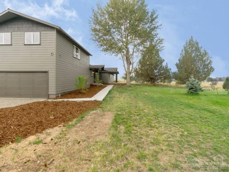 Newly remodeled home on large 1.98 acre lot with beautiful views of the Cascade Mountains. Entire home was remodeled this year and features 4 bedrooms, 2 baths, great floor plan w/ huge dining area & slider to new patio area, wood cabinetry throughout, large bonus room, master bath w/ double vanity, soaking tub & large shower stall, attached 2-car garage & 1.8 acres of irrigated land. Great location with close access to Eastside shopping & amenities!