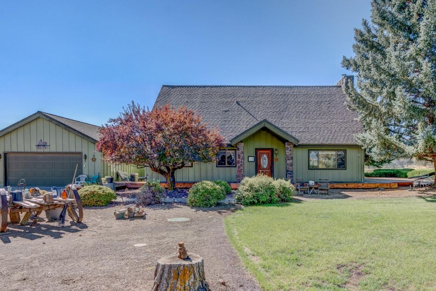 Stunning Cascade Mountain Views from country home in Tumalo. Property is 19.8 acres with pond and 12 acres TID water rights for pastures. Country Home is 3035 sq ft, 3 bedrooms, 2.5 bathroom, living room with wood burning stove, vaulted ceilings, dining area, office, bonus/game room and attached 2 car garage. House has beautiful outdoor living spaces with a covered porch, deck, large yard and fire pit. Outbuildings include: Hay Barn, Detached Garage/office, equipment shed and Indoor Arena for horses/livestock 11,280 sq ft with 6 stalls with runs, tack room, wash racks and 2 round pens. Property is close to riding trails. This is a wonderful opportunity to make this unique property your own!