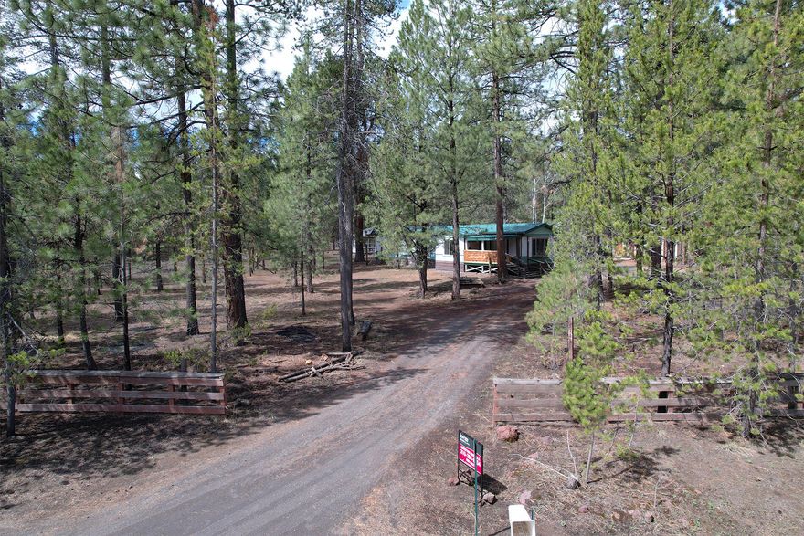 Great property & location on 1.92 acres with endless potential and space for your RV, ATV's, boats and other toys. Plenty of room to build a garage. Located on quiet street.  Home sits back on property for added privacy. 3 bedrooms, 2 baths, 1008 sq ft, RV Hookup, several outbuildings (sheds, wood workshop w/electricity (128 sq ft), greenhouse/garden shed/artist studio w/exhaust (80 sq ft), chicken coop w/shed att). Interior fencing cross fenced to keep the deer out.  Bring your update ideas with soo much potential. Excellent location close to fishing, hiking, hunting, lakes, rivers, camping, biking and all of your other favorite outdoor activities. Two miles from City of La Pine shopping, amenities & restaurants. 15 minutes to Sunriver, 35 minutes to Bend.  Updates include double pane aluminum windows throughout most of home, wood laminate flooring, new appliances, new plumbing, high speed fiber optics.