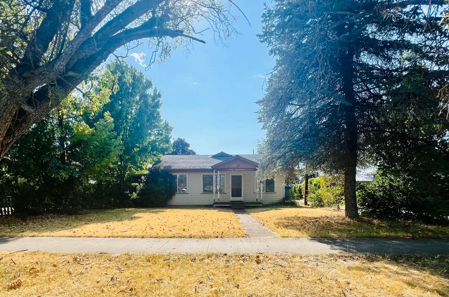 Investor Opportunity!  Unlock the potential in this 2-bedroom, 1-bath home with 928 sqft, ready for updates to maximize value. Features include a two-car garage, inside laundry, fenced backyard, storage shed, and alley access. Solid structure with great bones—just needs your vision to bring it to life. Ideal for a rental, flip, or long-term hold. Prime opportunity located in established neighborhood.